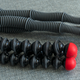 The legs of a GorillaPod tripod (bottom) compared to the redesigned legs on the PodZilla tripod (top).